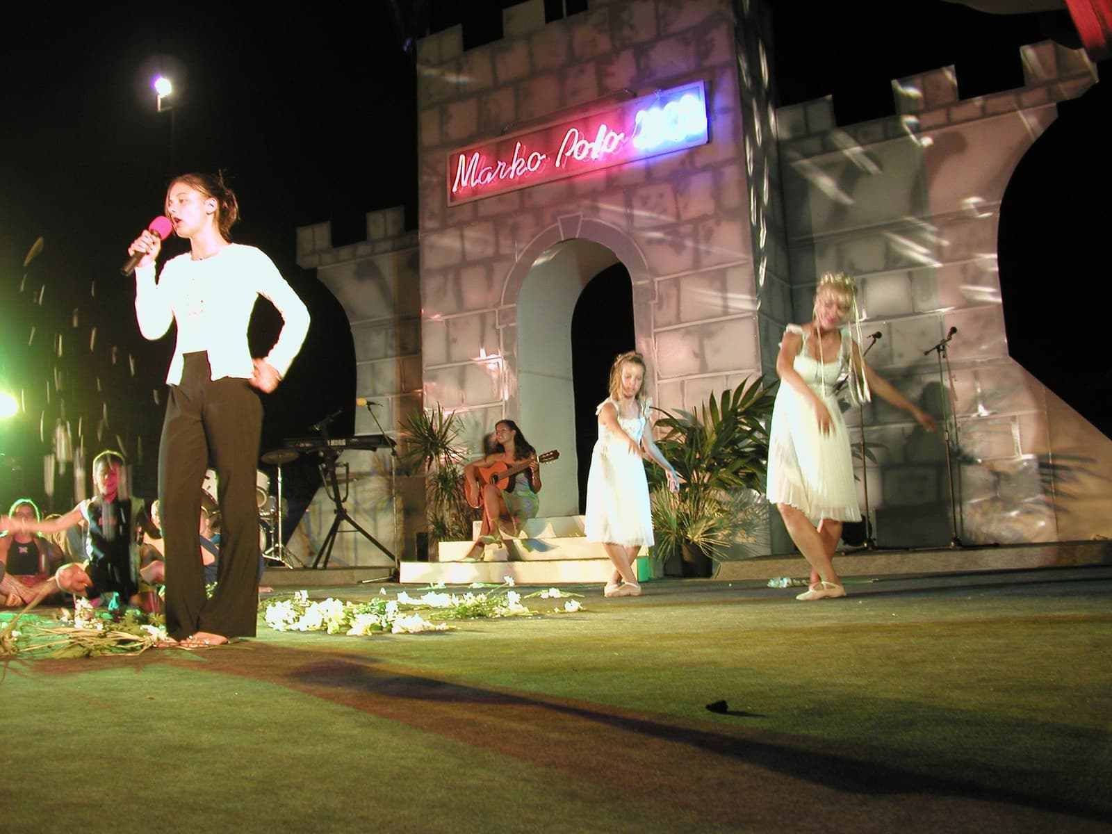 Performers on the summer stage with the festival's old-town scenography